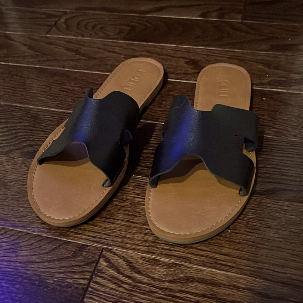 Black slide flat sandals, size 8